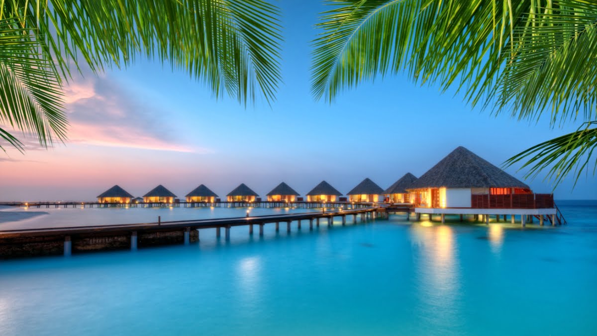 Luxurious overwater villas in the Maldives, a top luxury family holiday destination.